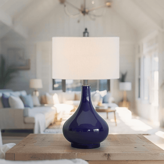 25-inch gourd-shaped navy glass lamp on nightstand in modern bedroom