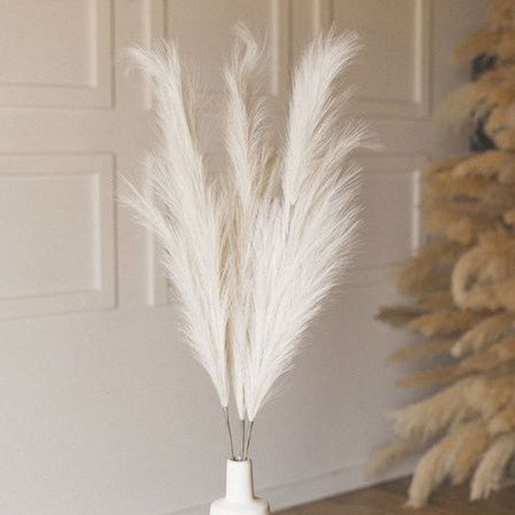 Close-up of the realistic, fluffy plume texture of the allergy-free artificial pampas grass for boho home decor.