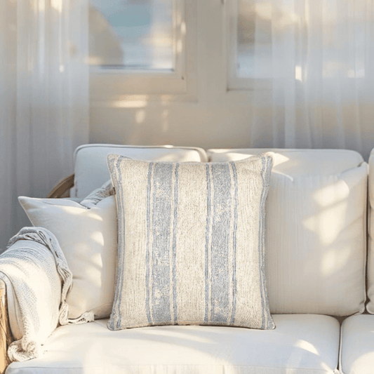 Beach-style couch pillow with woven texture