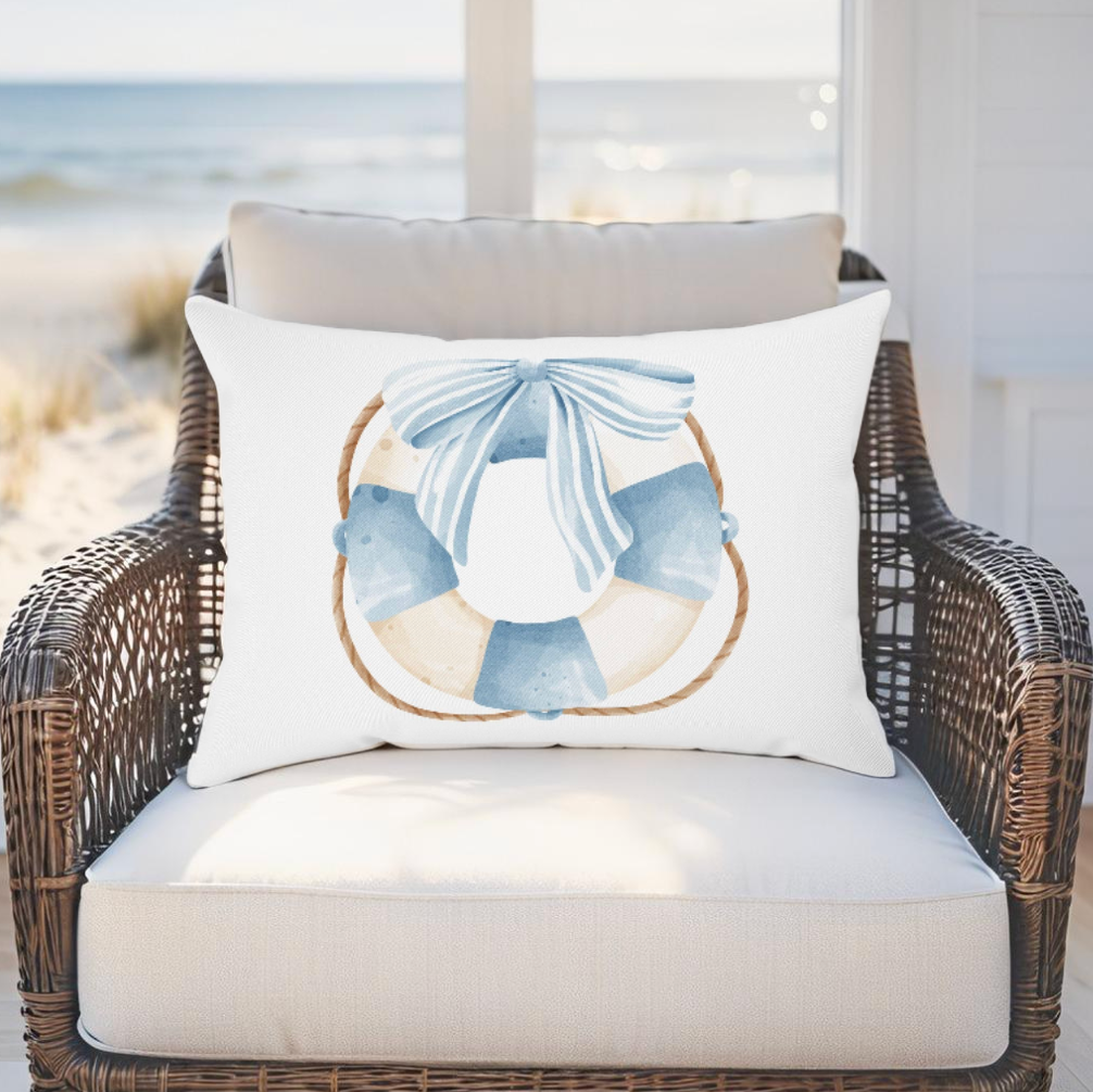 Lifesaver ring accent pillow for seaside and nautical homes, ideal for ocean-inspired living spaces.