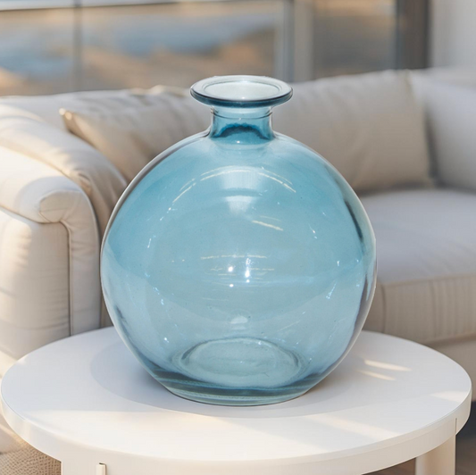 Blue glass vase set on modern table for home decor