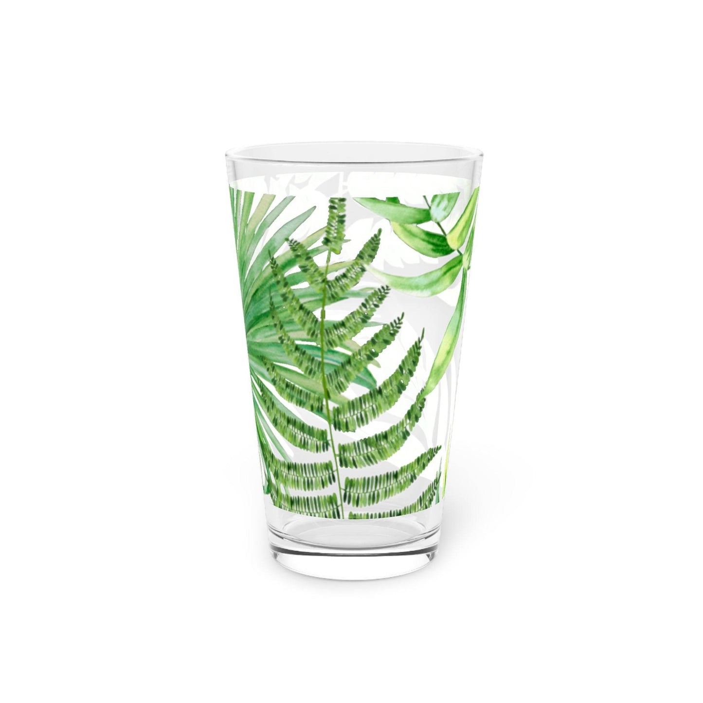 Boho tropical print drinking glass with colorful leaf pattern.