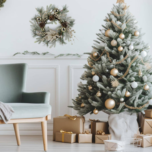 Artificial Christmas wreath for front door with snow-dusted pine needles and golden twigs