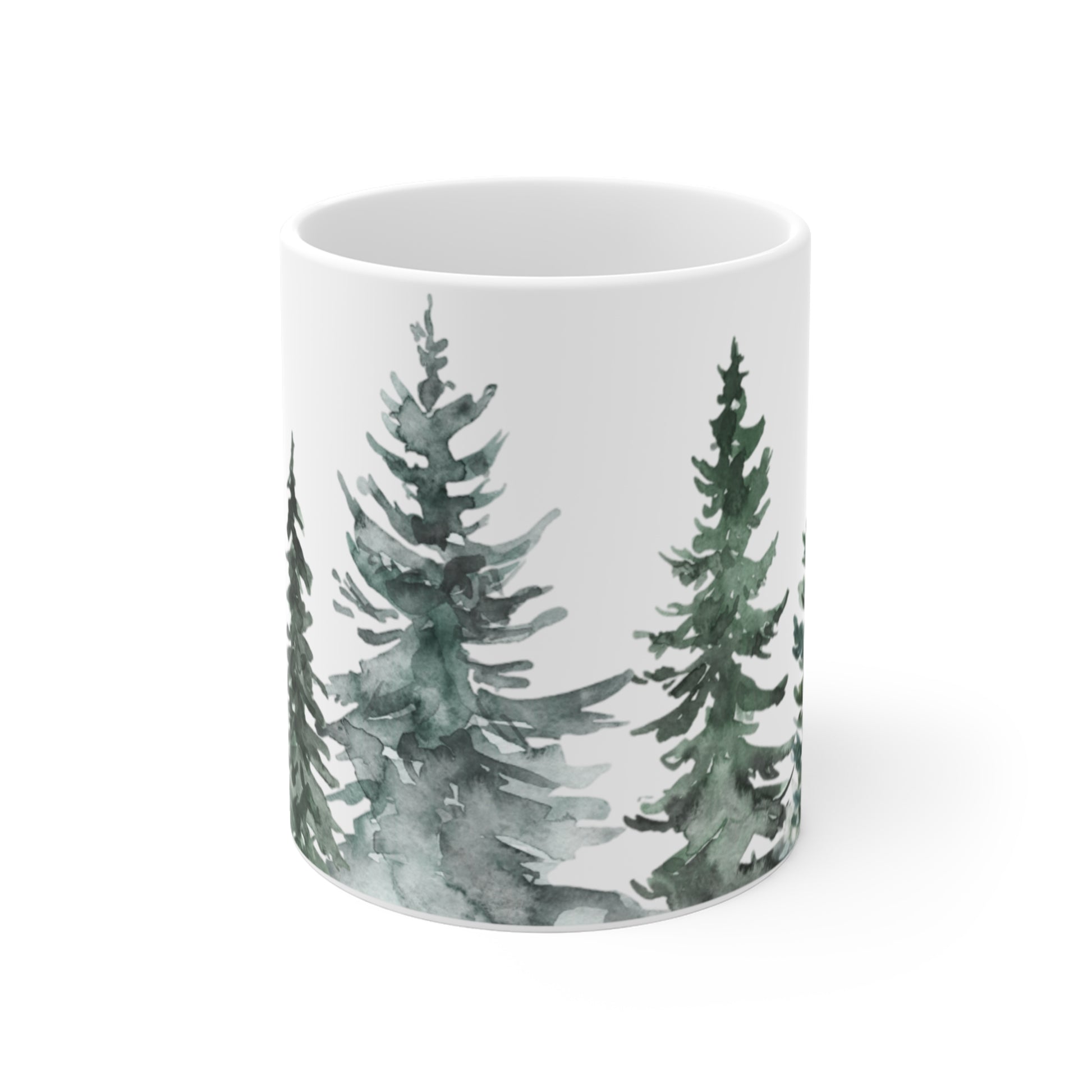 Lifestyle shot of a cute Christmas coffee mug filled with hot cocoa and marshmallows next to a fireplace, showing it as a gift.