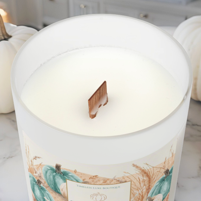 Luxury coastal fall candle styled with neutral décor for beach house autumn style.