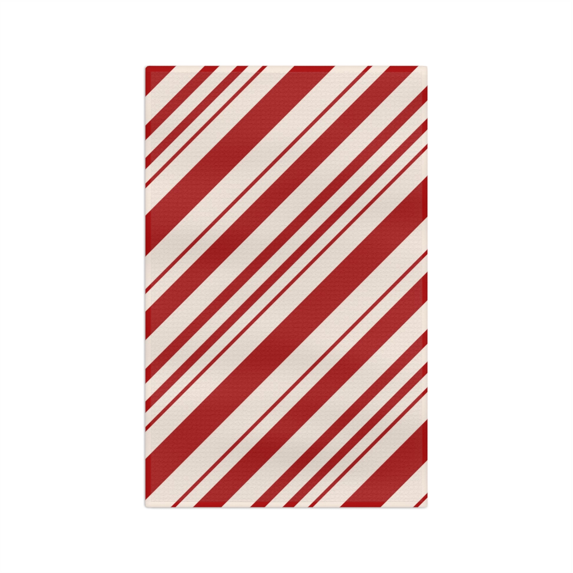 Highly absorbent 100% cotton red ticking stripe dish towel used for drying holiday glassware.