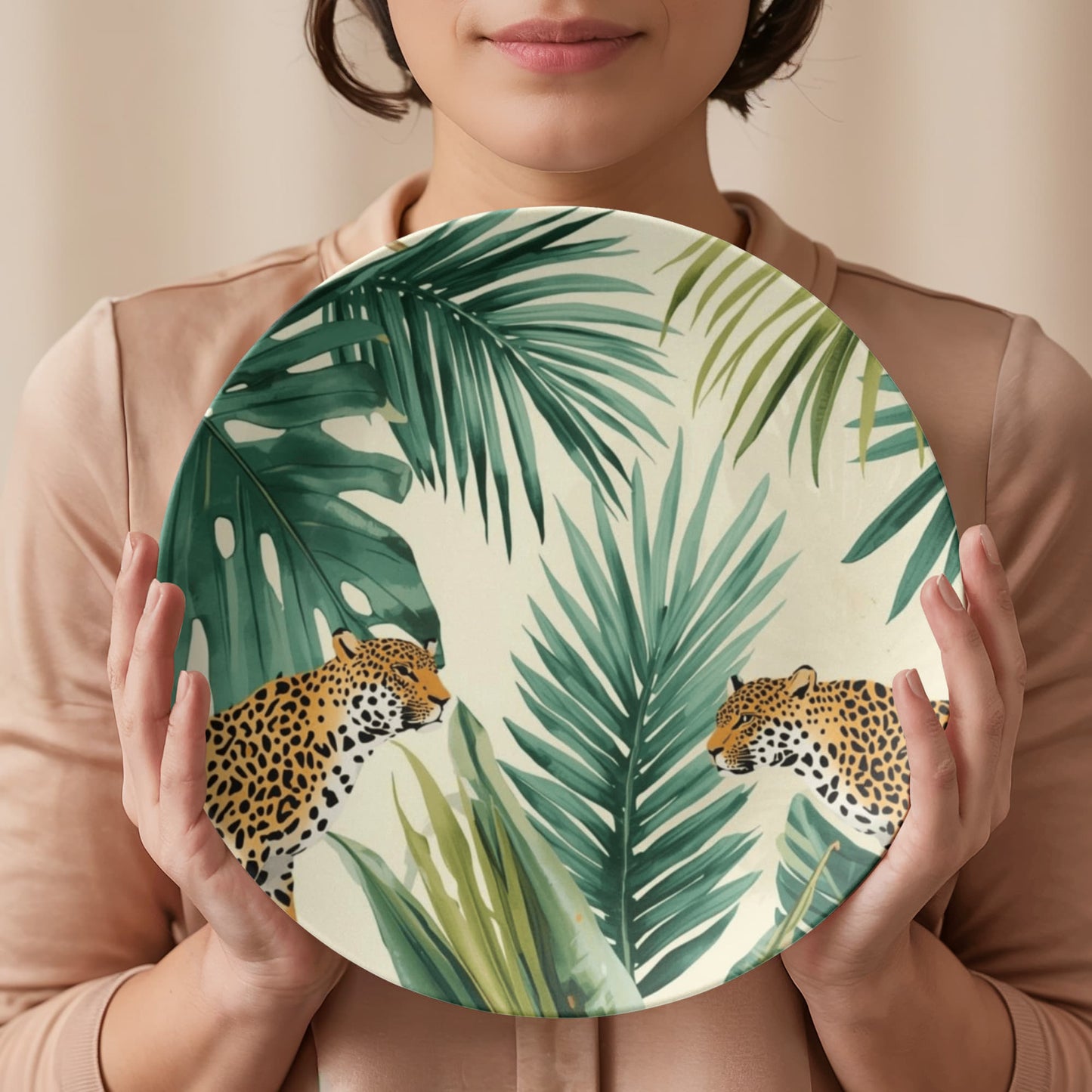 Stack of exotic animal print ceramic dinner plates with a bold jaguar pattern, perfect for luxury dinnerware collections.