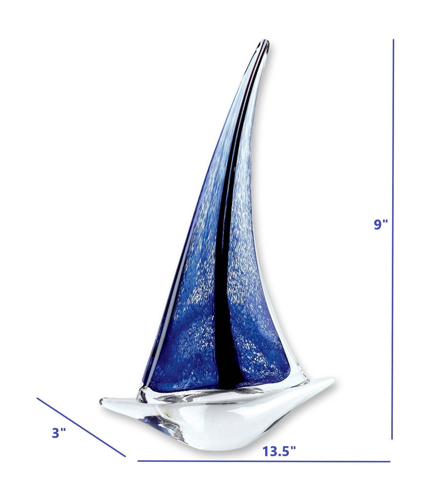Handcrafted blue glass sailboat decor in a seaside or beach-themed room