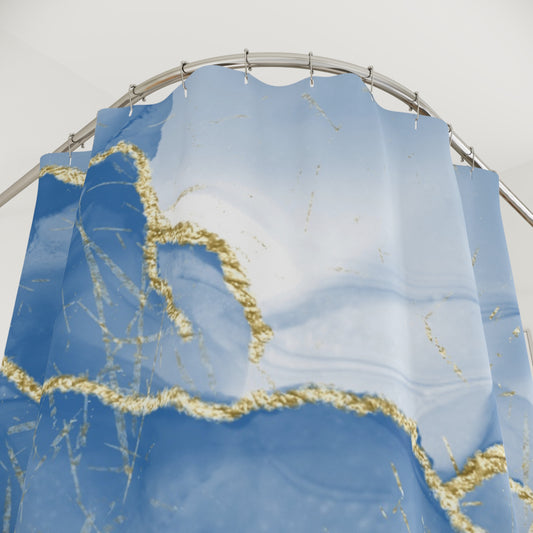 Coastal marble shower curtain featuring elegant blue and gold design
