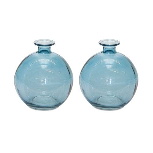 Modern blue glass vase set styled in living room setting