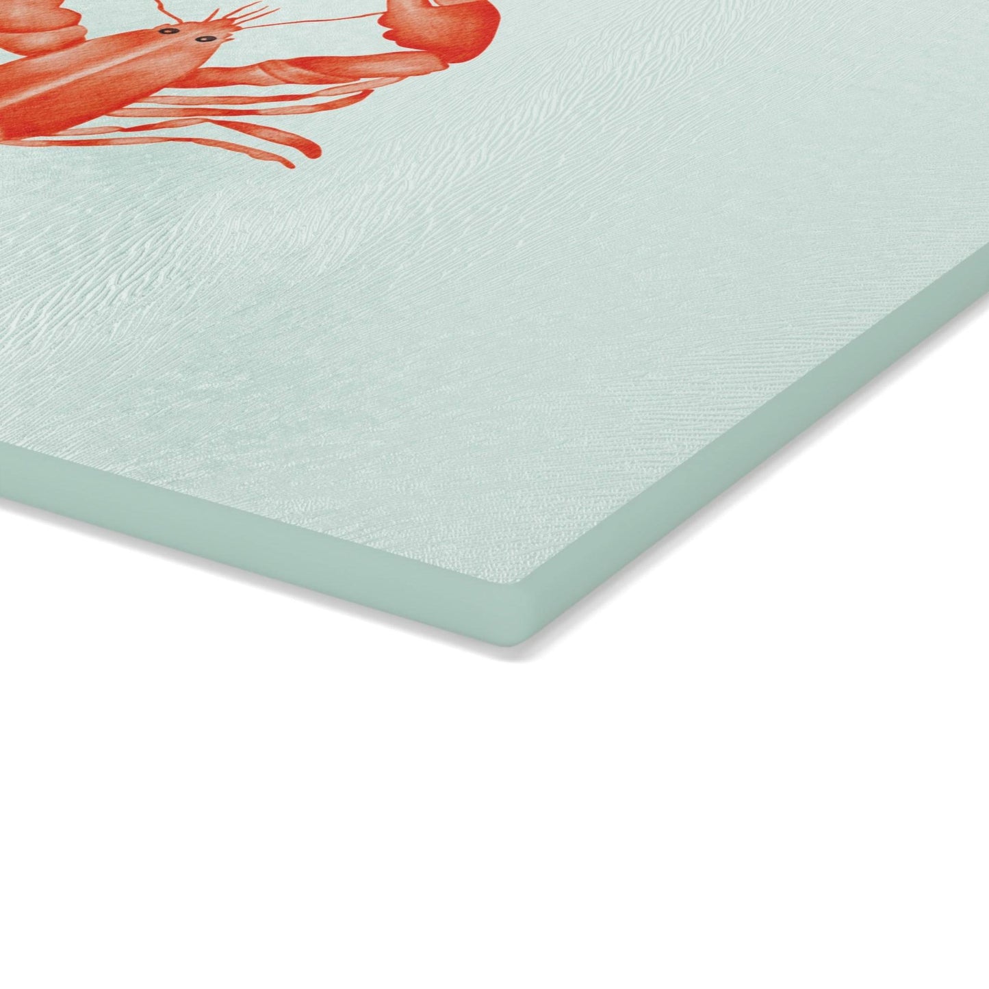 Seafood-themed cutting board featuring lobster illustration on glass