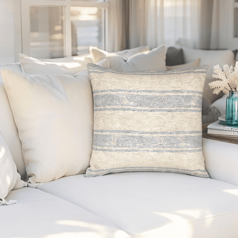 Close-up of blue and cream stripe throw pillow