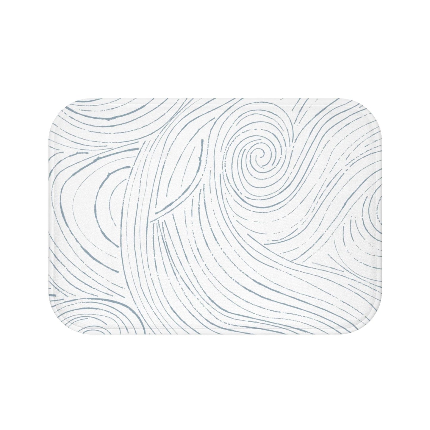 Beach-inspired bath mat featuring ocean waves and soft sand tones