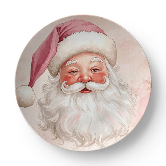 Whimsical Santa Claus holiday dinner plate set, shown stacked. Christmas dinnerware for modern decor.