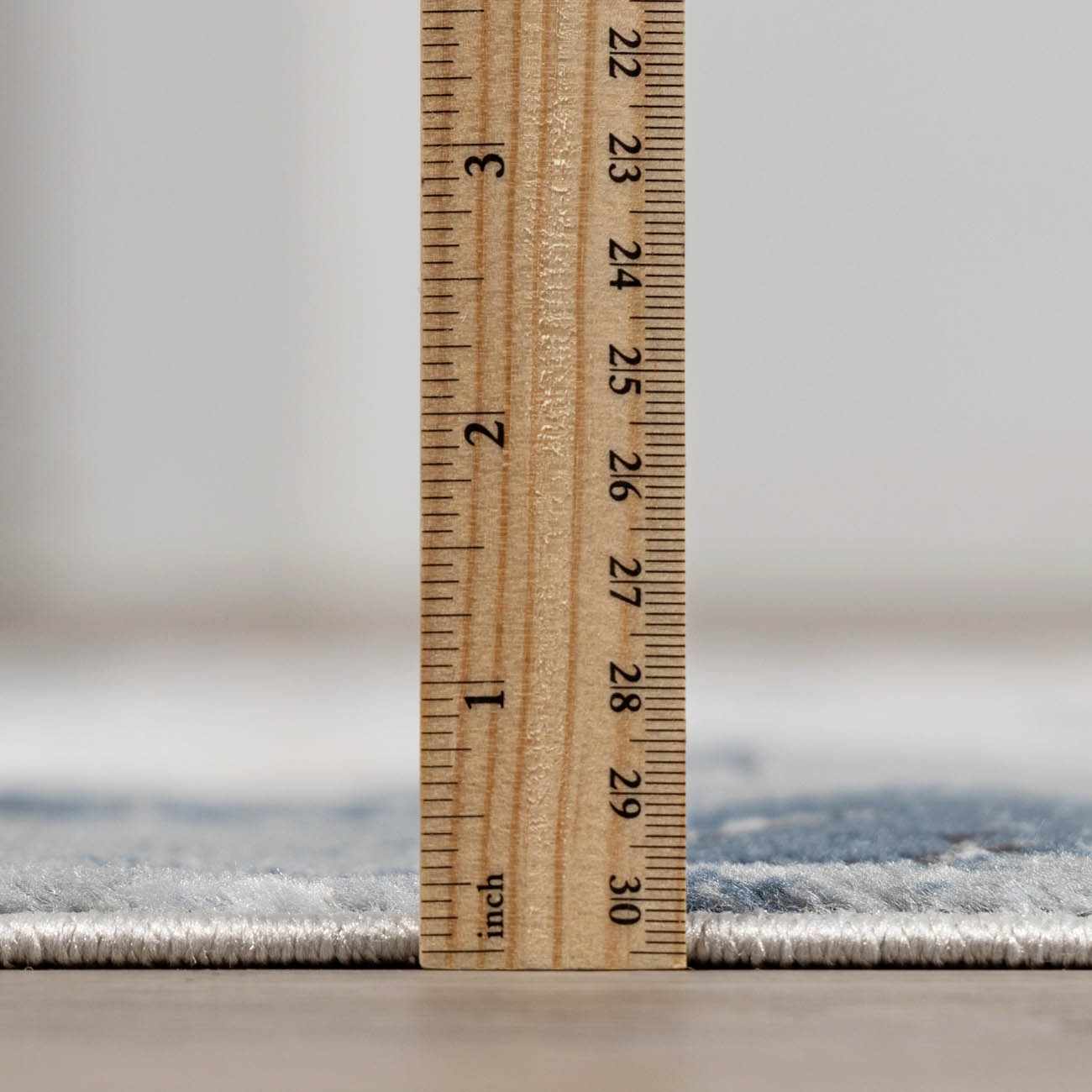 Detailed shot of the marble pattern blending gray with slate blue and silver gray highlights.