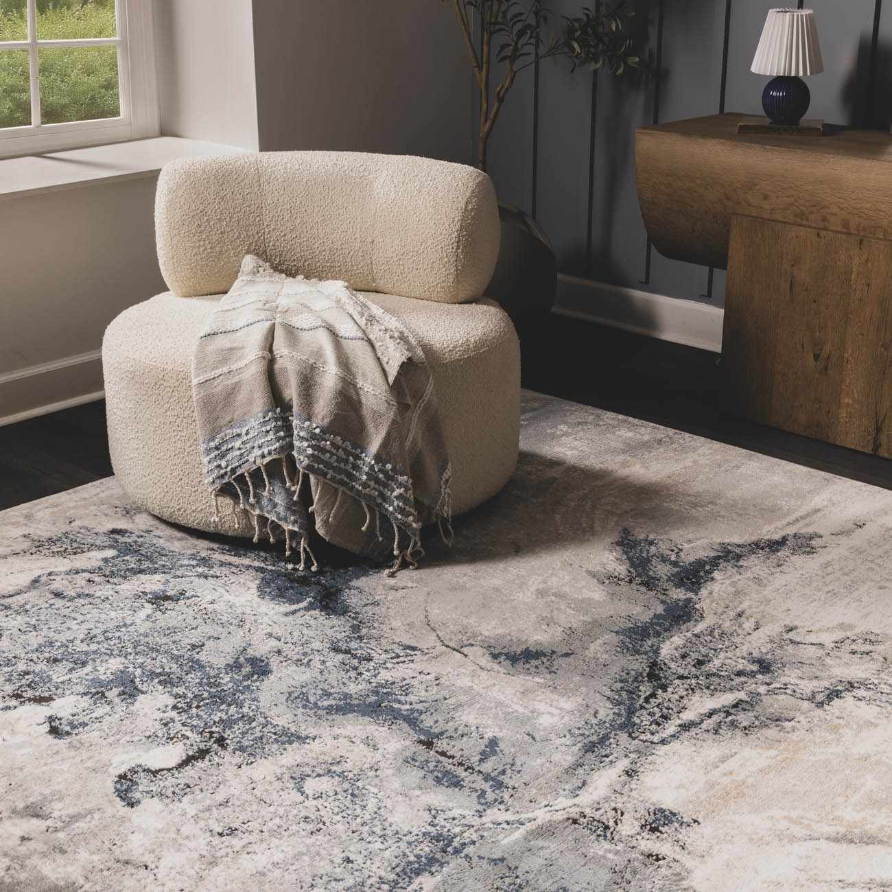 Close-up texture of the abstract pattern on a polypropylene, machine-woven rug with a low pile.