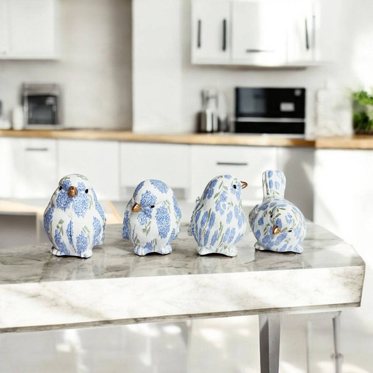 Blue hydrangea resin bird figurine perched on a white bookshelf with plants and blue accents.