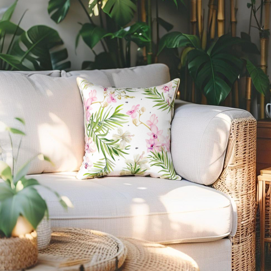 Pink and green tropical throw pillow for vibrant summer decor.