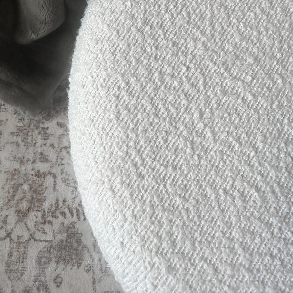 Boucle storage ottoman with removable lid highlighting interior space