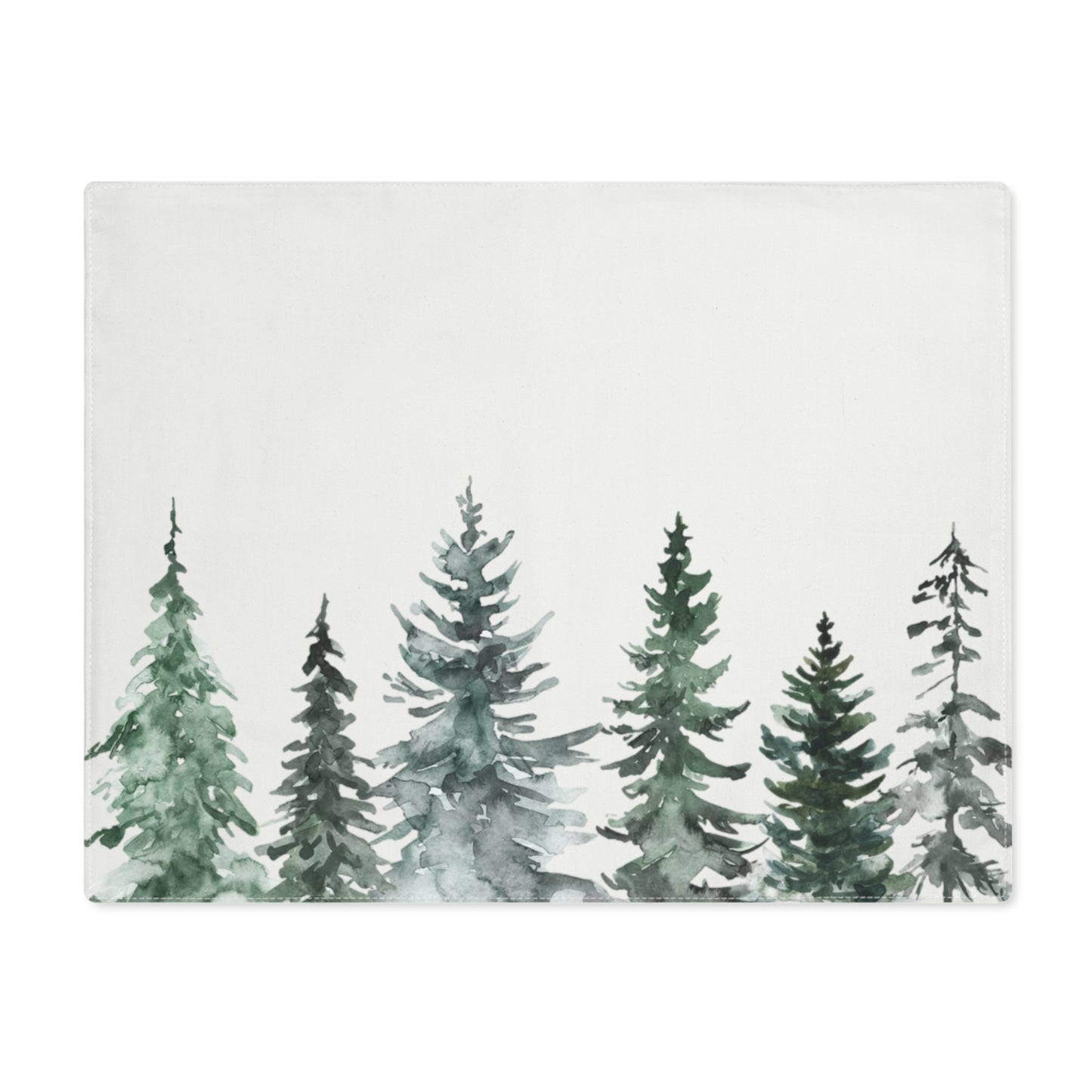 Holiday table setting with evergreen placemat