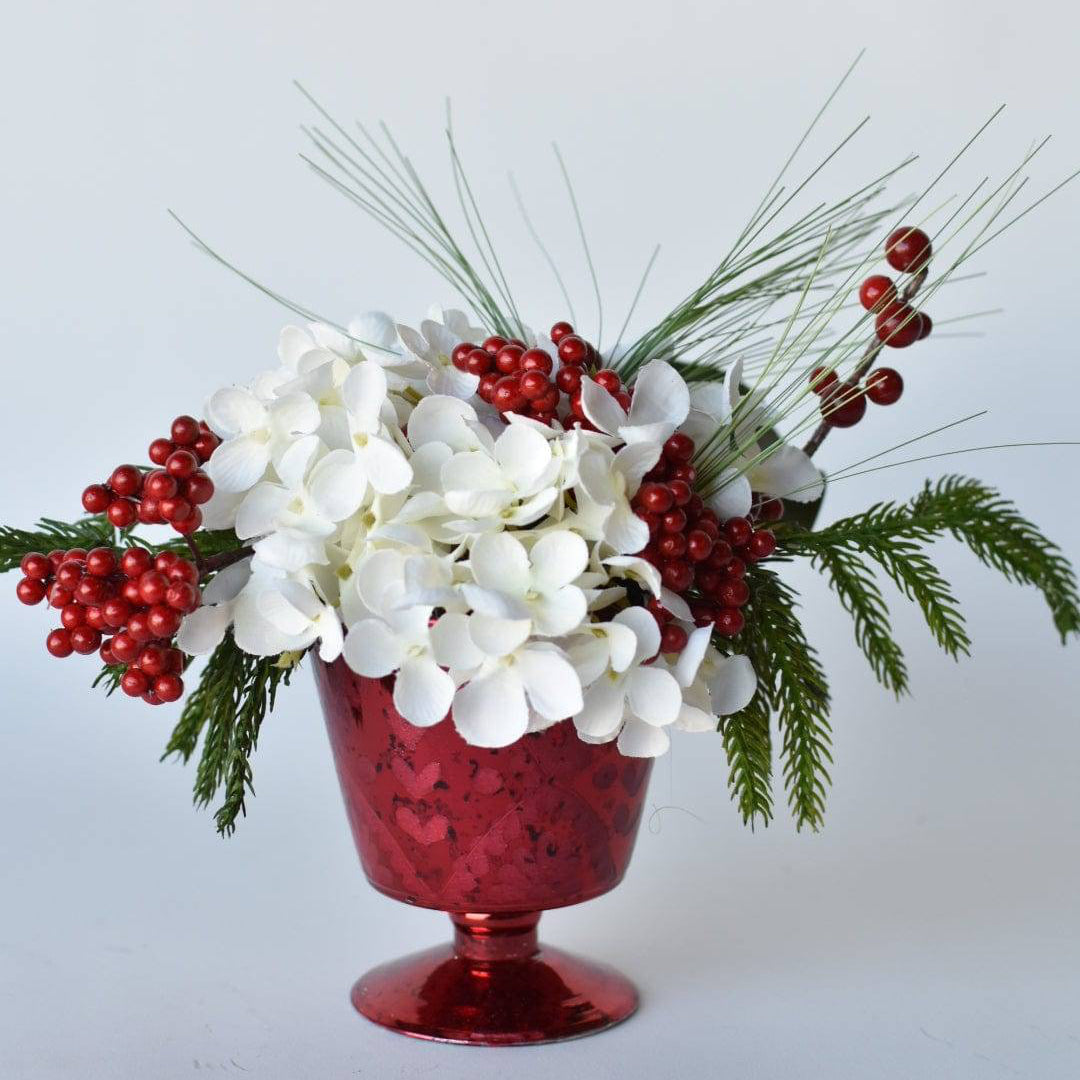 White Hydrangea and Greenery Floral Arrangement in Red Glass Container – Christmas Table Centerpiece.