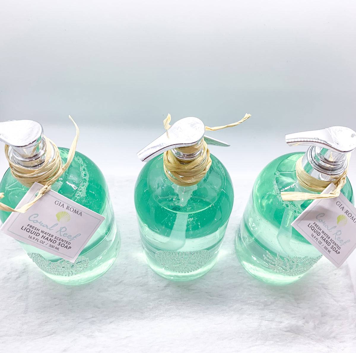 Three bottles of Gia Roma liquid hand soap on a white background for coastal bathrooms
