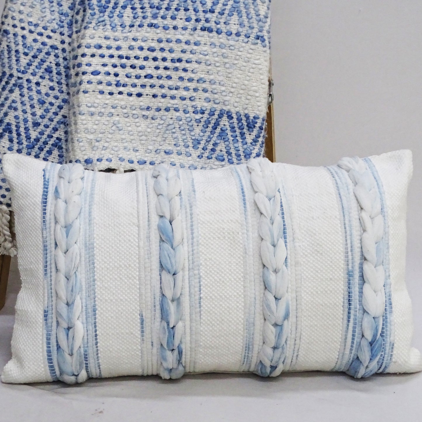 Coastal blue and white striped lumbar pillow with rope detail 14x24