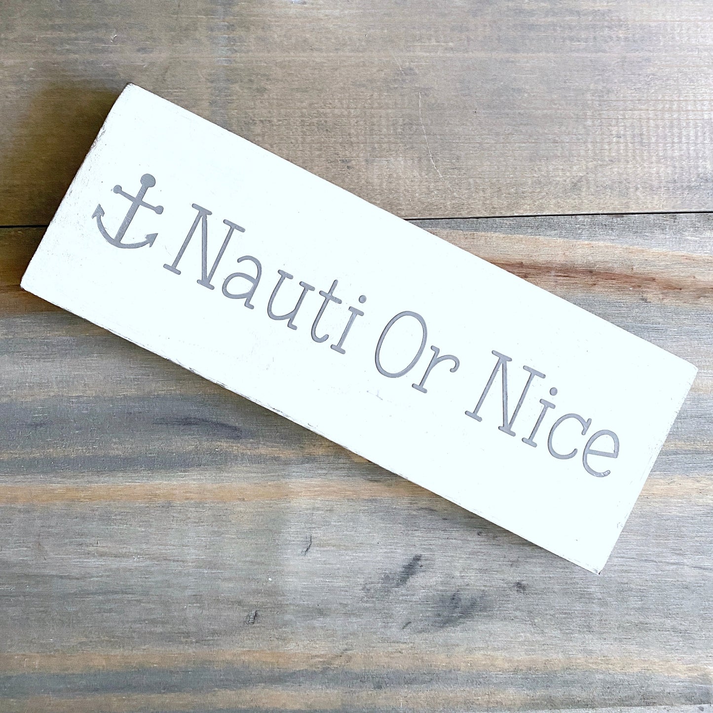 Nauti or Nice anchor sign