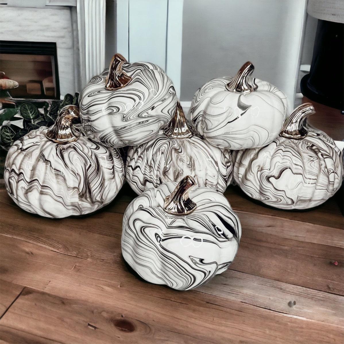 Collectible black and white pumpkin accent piece, designed for durable, long-term use as sophisticated seasonal home decor.