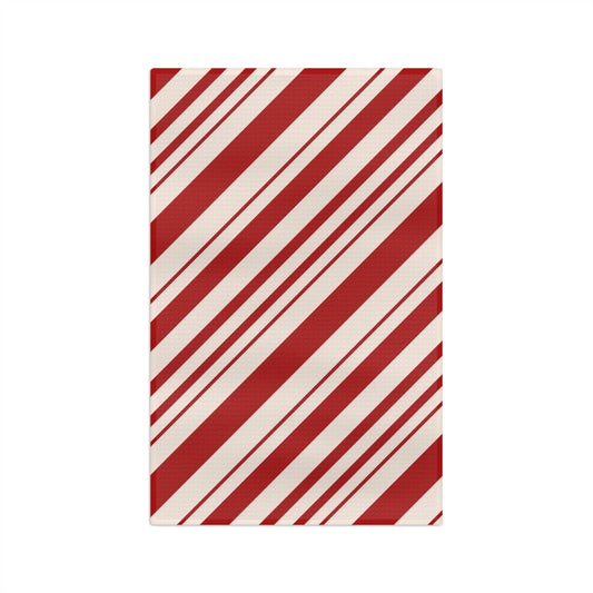 Highly absorbent 100% cotton red ticking stripe dish towel used for drying holiday glassware.