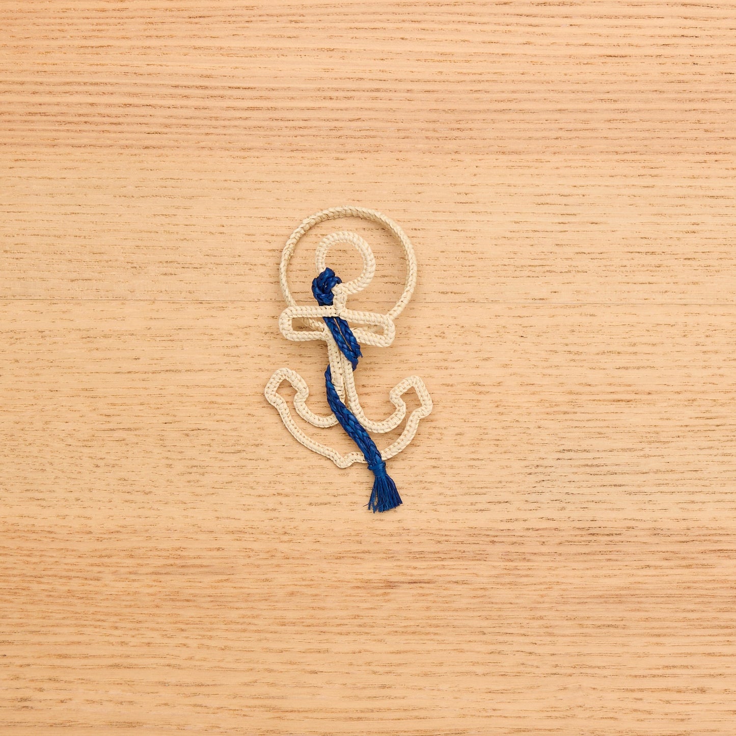 Detail shot of the ethical woven anchor napkin holder, highlighting the rope-wrapped design.
