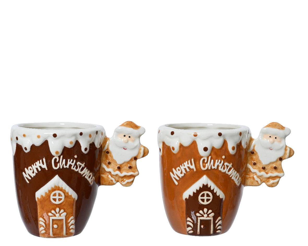Christmas mug featuring gingerbread house design