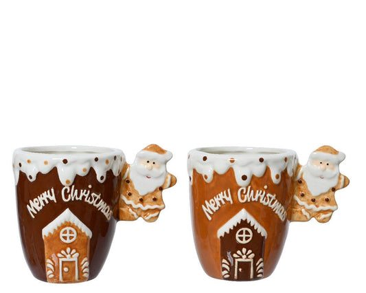 Christmas mug featuring gingerbread house design