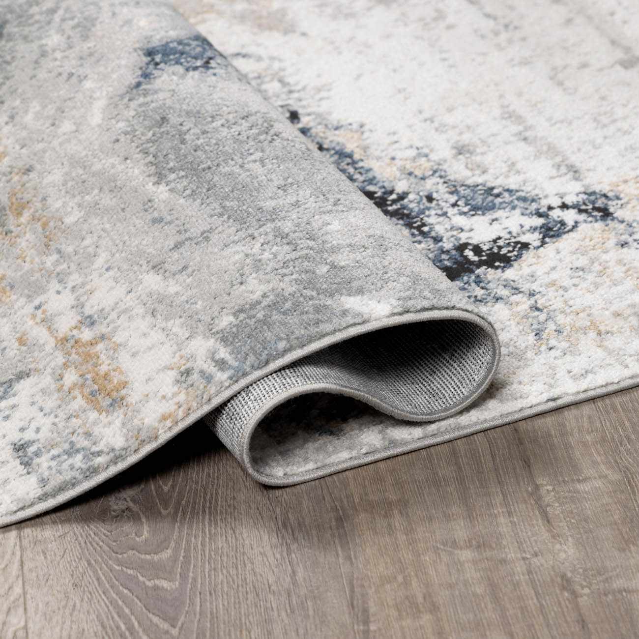 Detailed shot of the marble pattern blending gray with slate blue and silver gray highlights.