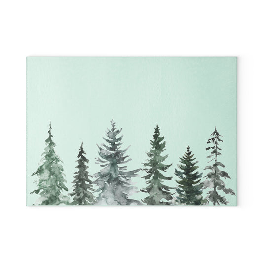 Festive glass serving board with watercolor evergreen forest for holiday appetizers.