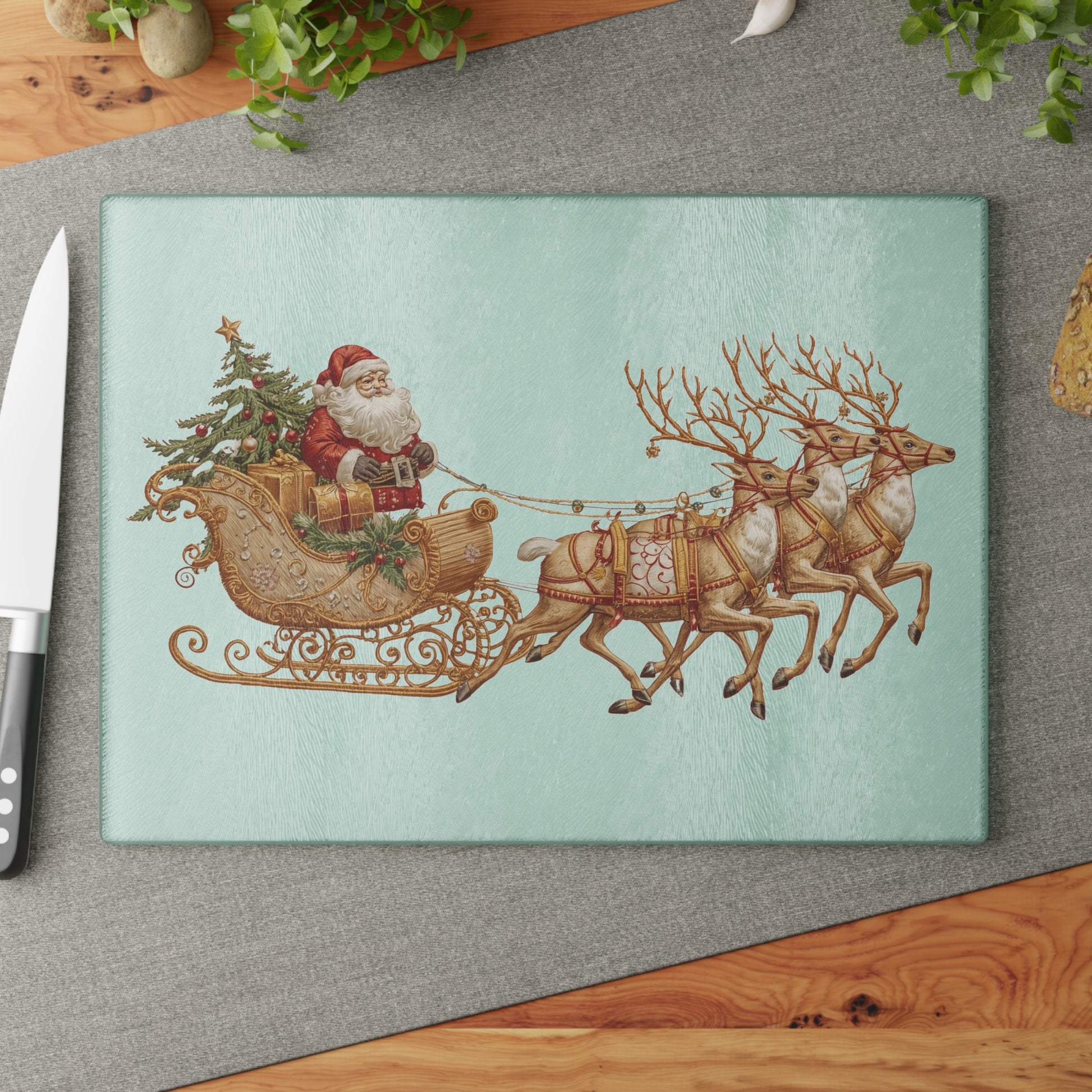 Santa sleigh glass cutting board displayed on a holiday kitchen counter