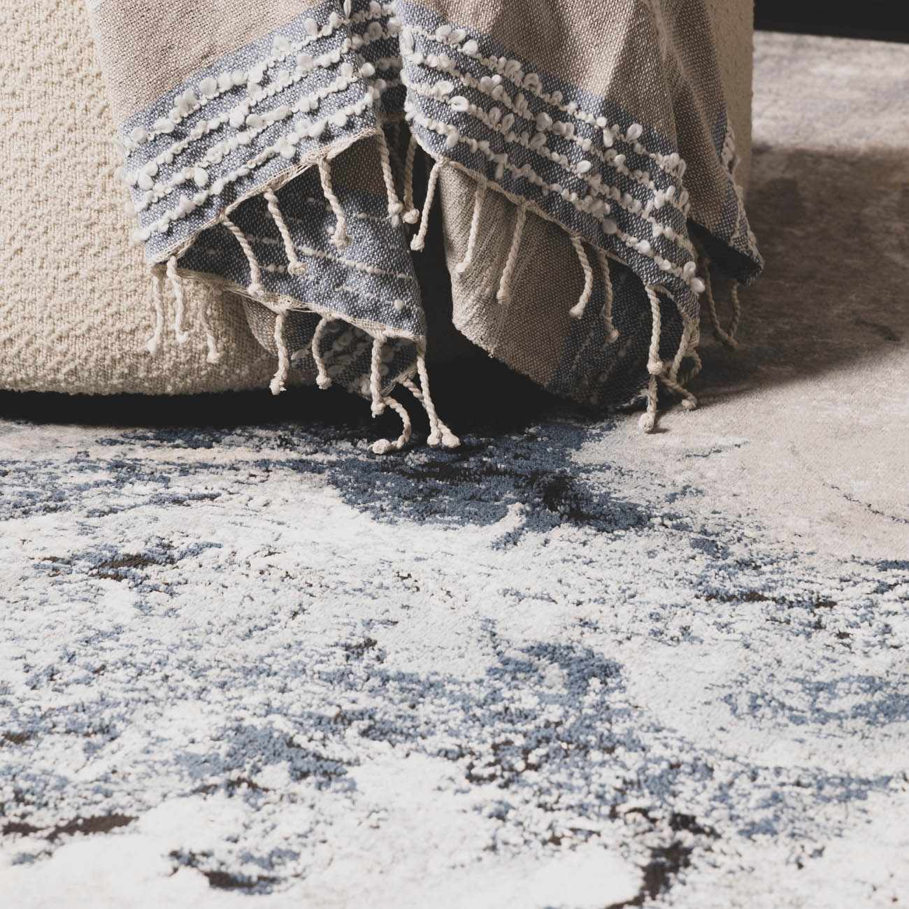 Medium-pile gray and blue rug showing the mix of colors: silver gray, slate blue, and charcoal.