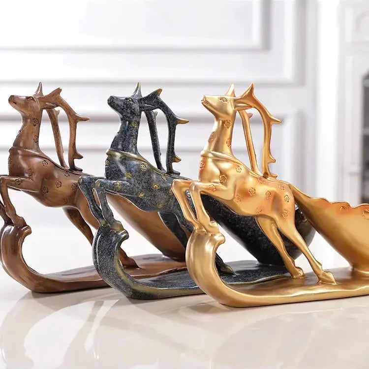 Set of four horse-shaped sculptures in different colors on a reflective surface with a blurred background.