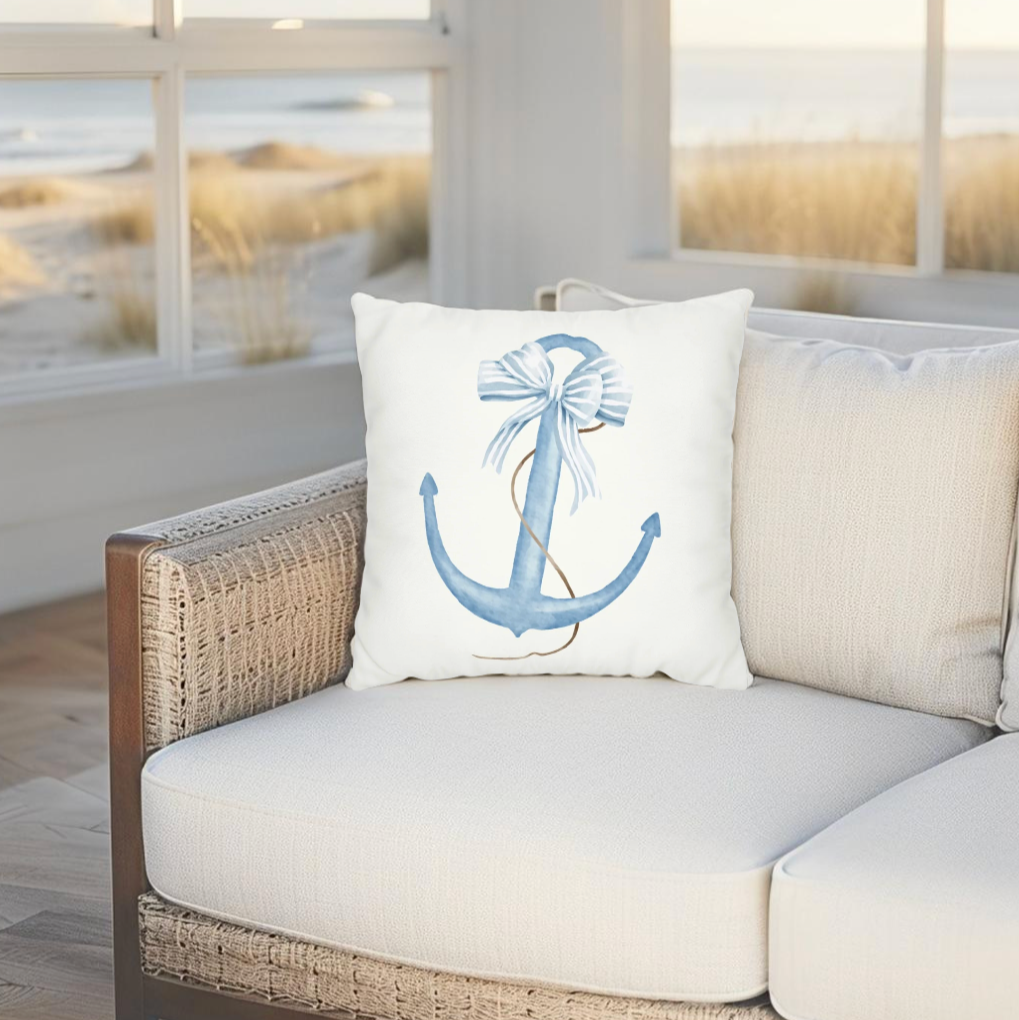 Navy blue anchor throw pillow perfect for nautical and coastal home decor.
