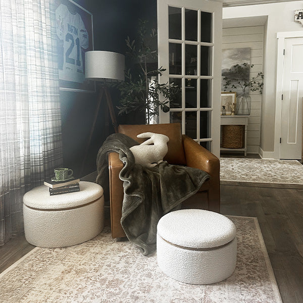 Boucle storage ottoman styled as a small coffee table with a tray