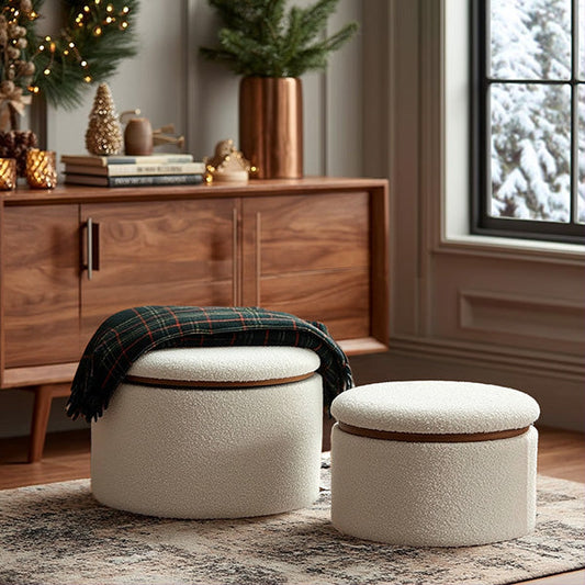 Set of two round boucle upholstered storage ottomans in a living room