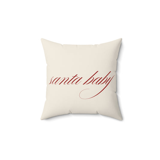 Minimalist living room styled with blush Santa Baby throw pillow and modern holiday decor.