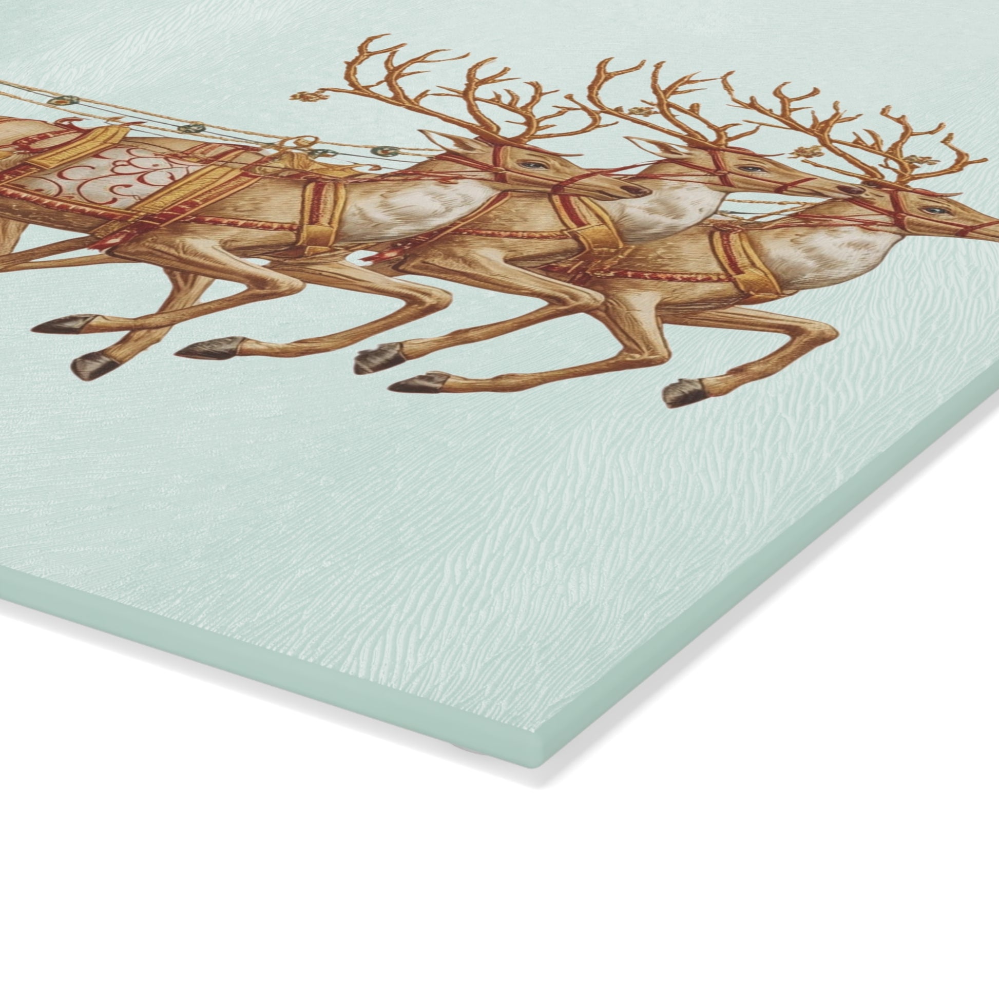 vintage-style Santa sleigh illustration printed on textured glass cutting board