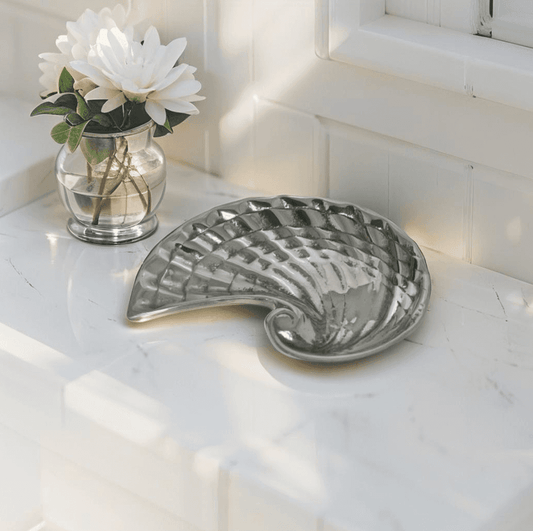 Seashell-shaped ceramic soap dish for coastal bathroom decor