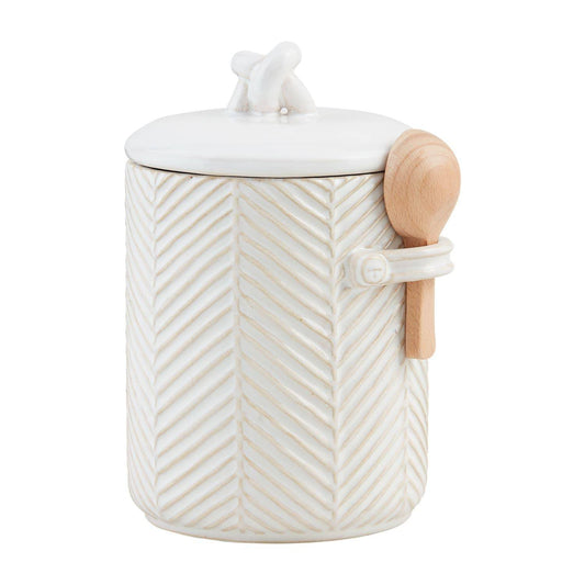 Textured stoneware coffee canister with wooden spoon