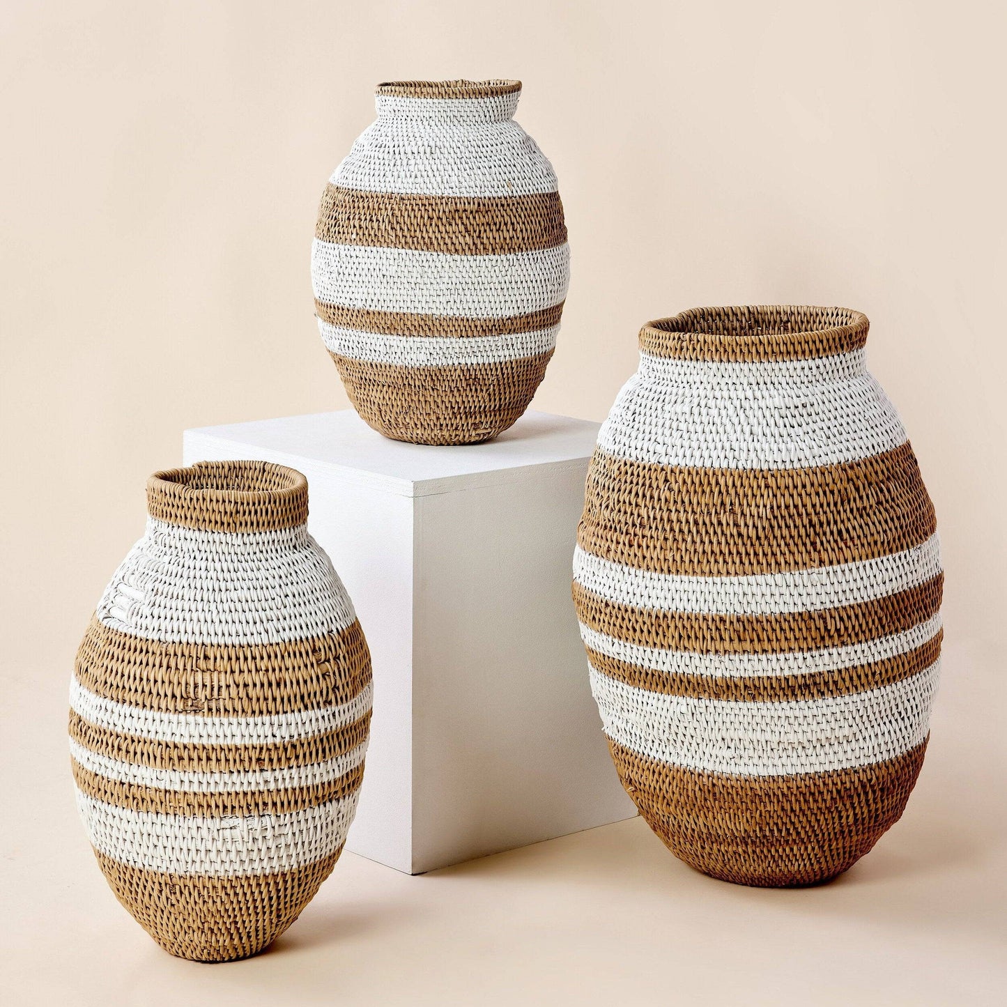 White striped Buhera basket, handwoven natural fiber African storage decor.