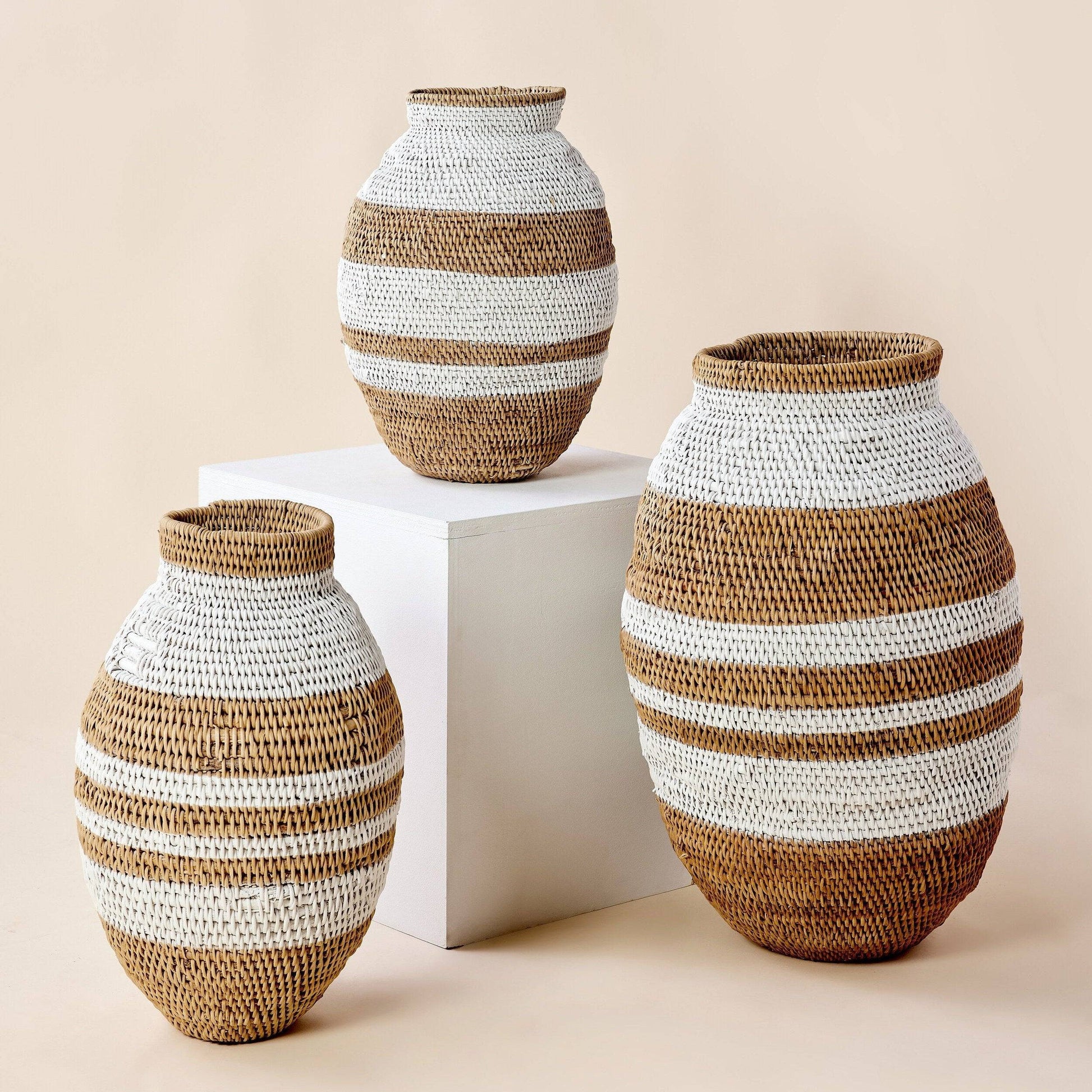 White striped Buhera basket, handwoven natural fiber African storage decor.