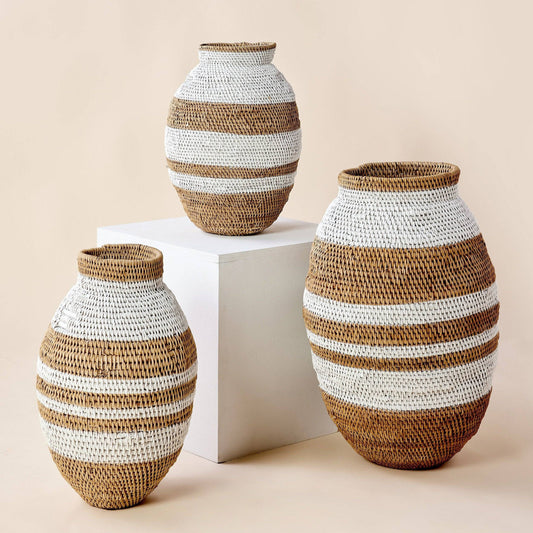 White striped Buhera basket, handwoven natural fiber African storage decor.