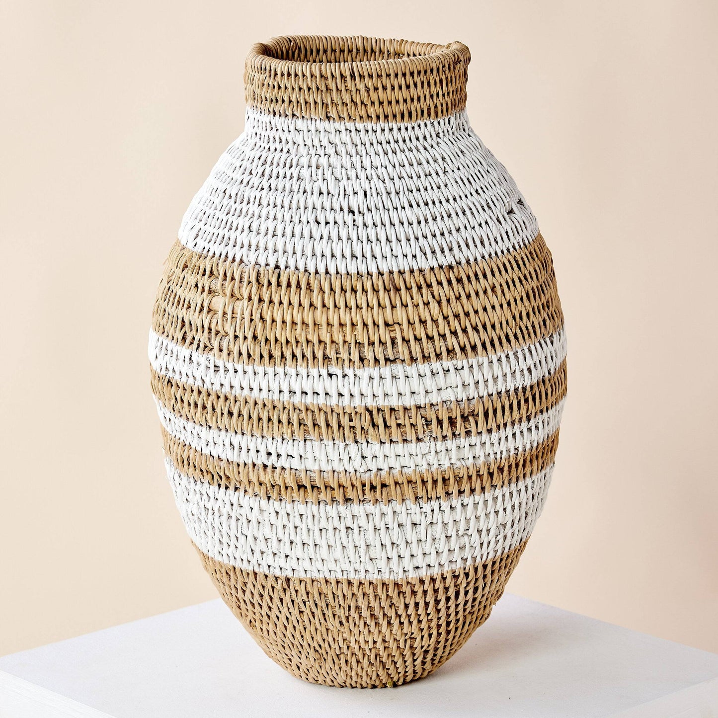 Close up of the tight natural fiber weaving and white stripe pattern.