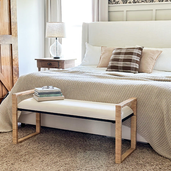 Spacious woven rattan seating on natural wood bench, coastal rustic furniture design.